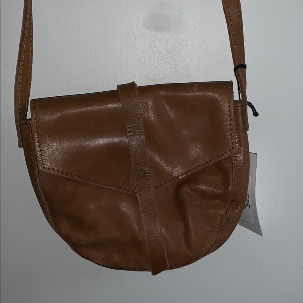 Medium to light honey brown leather crossbody bag